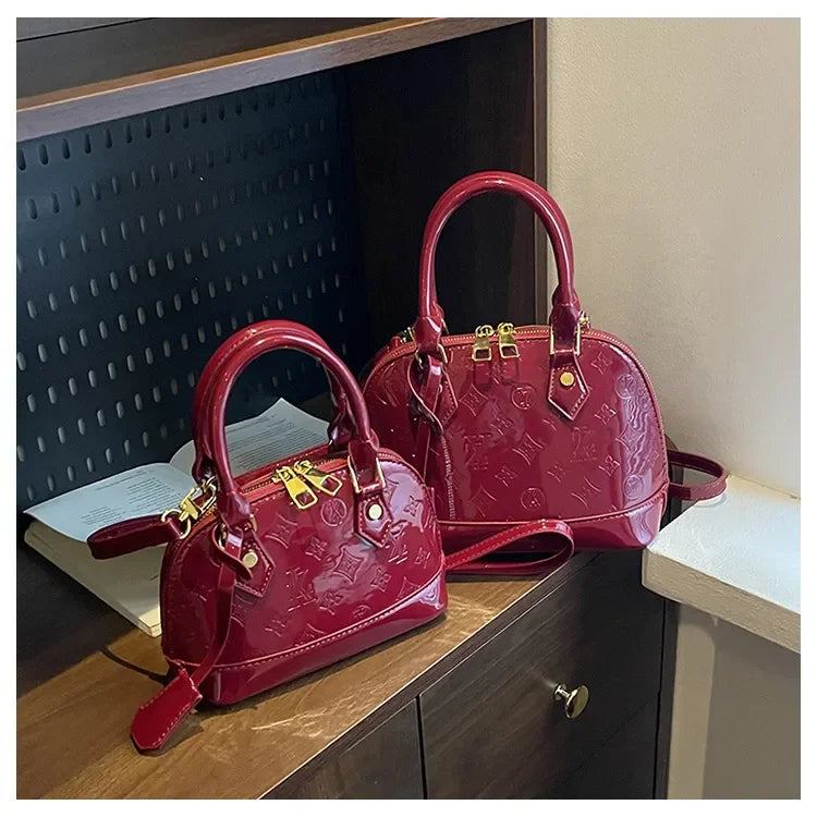 2025 Designer Hottest Shell Fashion Versatile Glossy High Quality Women Shoulder Crossbody Bag Available in Red Black and More
