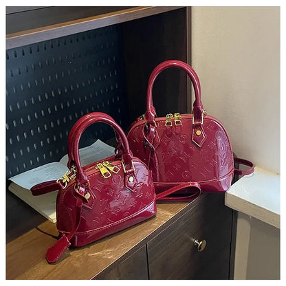 2025 Designer Hottest Shell Fashion Versatile Glossy High Quality Women Shoulder Crossbody Bag Available in Red Black and More
