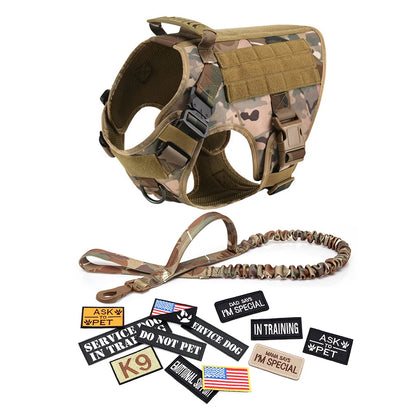 Camouflage tactical dog harness set with leash and assorted removable patches for training.