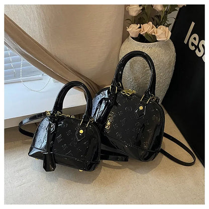 2025 Designer Hottest Shell Fashion Versatile Glossy High Quality Women Shoulder Crossbody Bag Available in Red Black and More