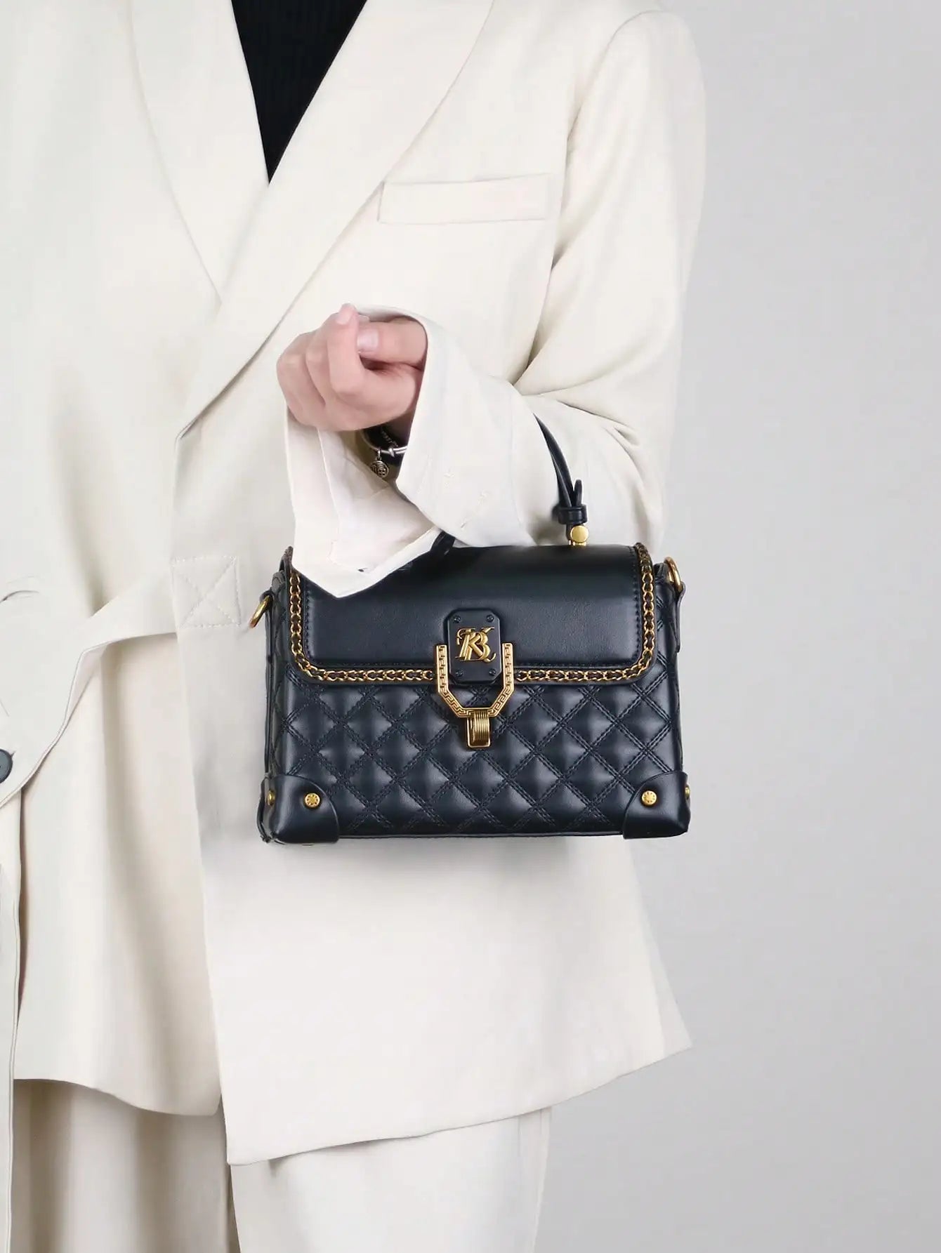 2026 fashion new handbag high quality light luxury niche design high sense heavy industry leather rhombic foreign style small ba